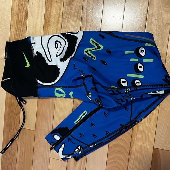 Nike Epic Faster Hackney Women's Mid-Rise 7/8 Running Leggings - Picture 3 of 6